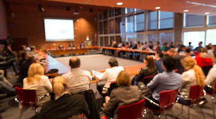 Image showing Public speaker giving talk at business event.