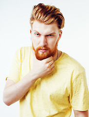 Image showing young handsome hipster ginger bearded guy looking brutal isolated on white background, lifestyle people concept