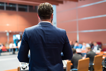 Image showing Public speaker giving talk at Business Event.