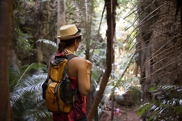 Image showing Woman in hat with backpacks