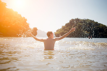 Image showing Photo of guy in sea