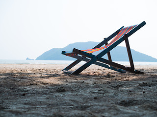 Image showing Chaise lounge on sandy beach