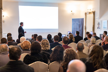 Image showing Public speaker giving talk at Business Event.