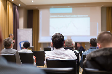 Image showing Male speeker having talk at public event.