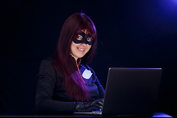 Image showing Girl in mask at night