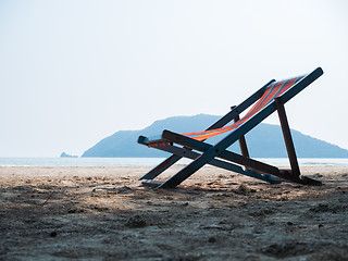 Image showing Deck chair on sandy beach