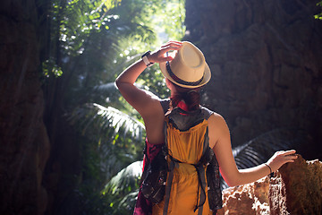 Image showing Girl with hat in ravine