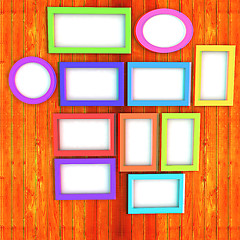 Image showing Mock up picture frames on wood wall. 3d illustration. Anaglyph. 