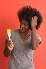 Image showing black woman painting wall