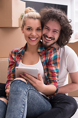 Image showing young couple moving  in new house