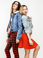 Image showing lifestyle people concept: two pretty stylish modern hipster teen girl having fun together, happy smiling making selfie