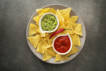 Image showing Guacamole and tomato salsa