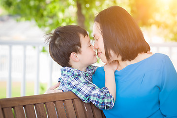 Image showing Outdoor Portrait of Chinese Mother with Her Mixed Race Chinese a