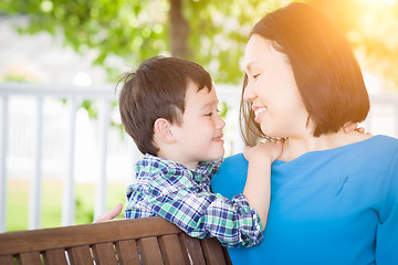 Image showing Outdoor Portrait of Chinese Mother with Her Mixed Race Chinese a