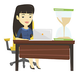 Image showing Asian business woman working in office.