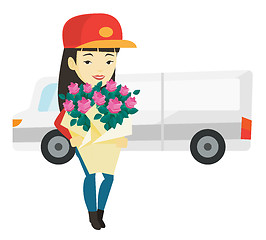 Image showing Delivery courier holding bouquet of flowers.