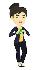 Image showing Business woman putting money bribe in pocket.