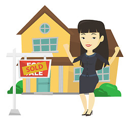 Image showing Real estate agent with sold placard.