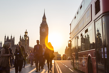 Image showing Traffic and random people on Westminster Bridge in sunset, London, UK.