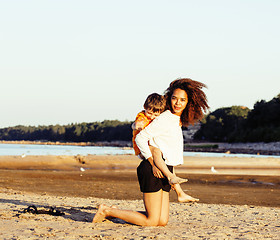 Image showing pretty diverse nation and age friends on sea coast having fun, lifestyle people concept on beach vacations close up