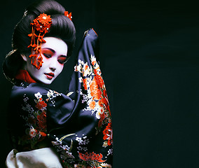 Image showing young pretty geisha in kimono