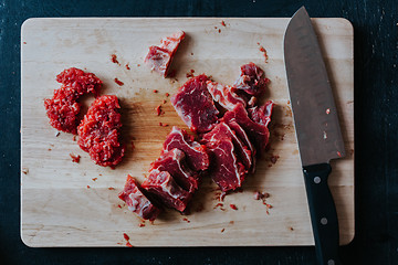 Image showing Chopped meat on cutting board