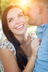 Image showing Happy Mixed Race Romantic Couple Portrait in the Park.