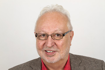 Image showing Elderly person with glasses and full beard smiling pleased