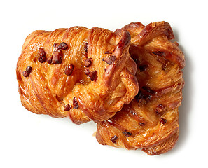 Image showing freshly baked pecan buns isolated on white