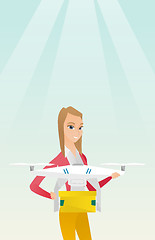 Image showing Woman controlling delivery drone with post package