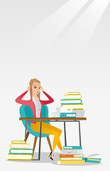 Image showing Student sitting at the table with piles of books.