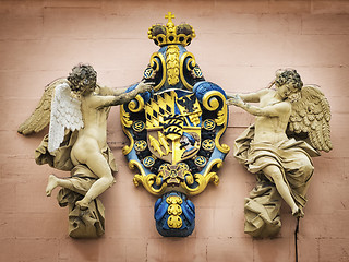 Image showing coat of arms with two angels