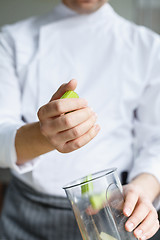 Image showing Crop faceless shot of chef cooking