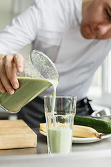 Image showing Male cooking fresh vegetable smoothie