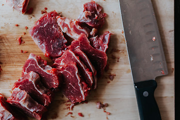 Image showing Chopped meat on cutting board