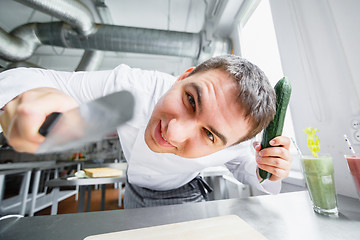 Image showing Young male chef having fun