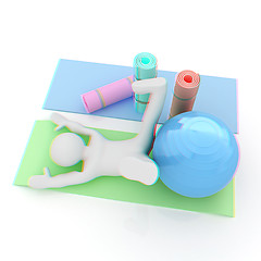 Image showing 3d man on a karemat with fitness ball. 3D illustration. Anaglyph