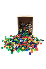 Image showing plastic pet caps in paper box