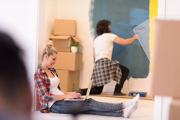 Image showing Happy couple doing home renovations