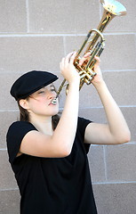 Image showing Female trumpet player.