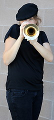 Image showing Female trumpet player.