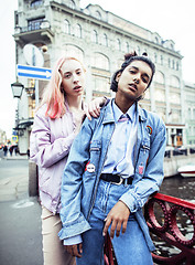 Image showing Two teenage girls infront of university building smiling, having