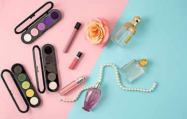 Image showing Cosmetics on modern colorful background