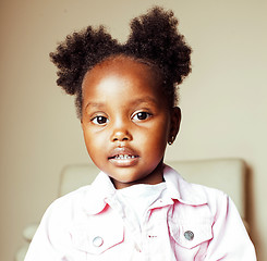 Image showing little cute sweet african-american girl playing happy with toys 