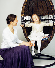 Image showing young mother with daughter at luxury home interior vintage