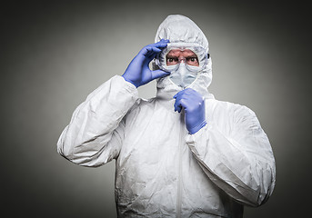 Image showing Man With Intense Expression Wearing HAZMAT Protective Clothing A