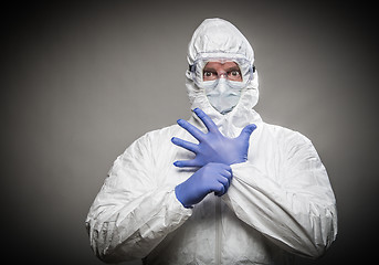 Image showing Man With Intense Expression Wearing HAZMAT Protective Clothing A