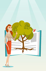 Image showing Student pointing at tree of knowledge.