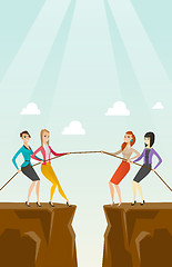 Image showing Two groups of business people pulling rope.