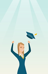 Image showing Graduate throwing up graduation hat.